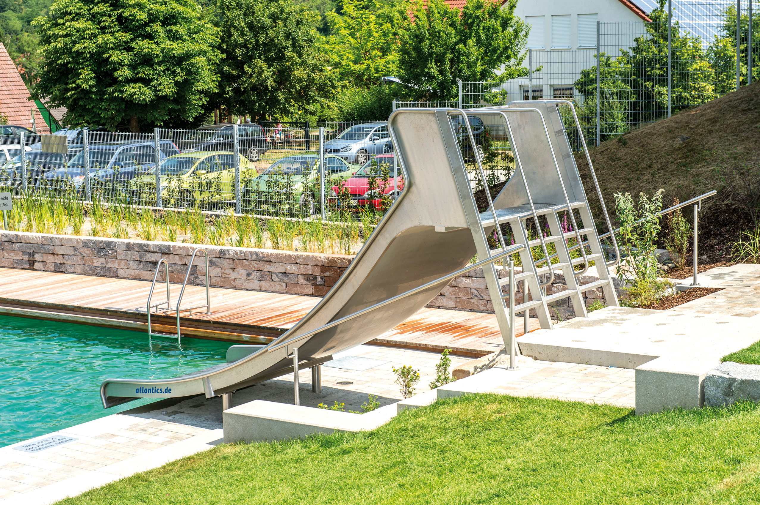 atlantics stainless steel slides open air swimming pool aura euervillage bayern boxwater pool 137517